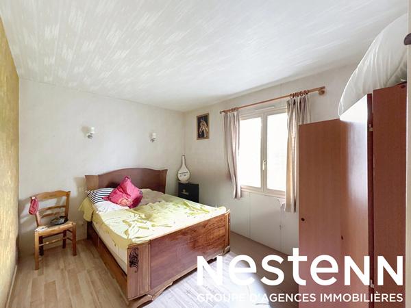 A vendre : Maison de plain pied avec véranda et joli jardin proche CRECHES SUR SAONE