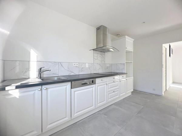 Appartement T4 avec garage , 2 places de parking  et jardin au calme