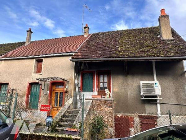 Maison d'habitation comprenant : une cuisine avec un accès à un cellier, une salle de bains, un...