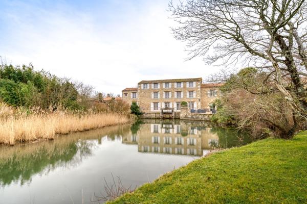 Beau Moulin exploité en hotel restaurant de charme