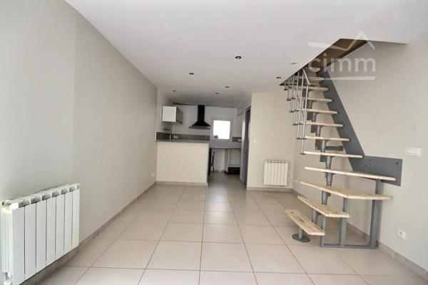 centre village,  APPARTEMENT F2 bis duplex de 46.89m² au 1er étage.