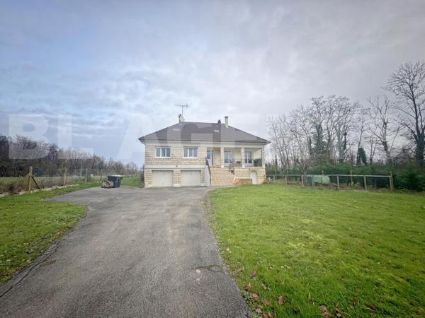 Maison de 147 m² (207 m² sol) + sous-sol, sur un terrain de 2 700 m² 