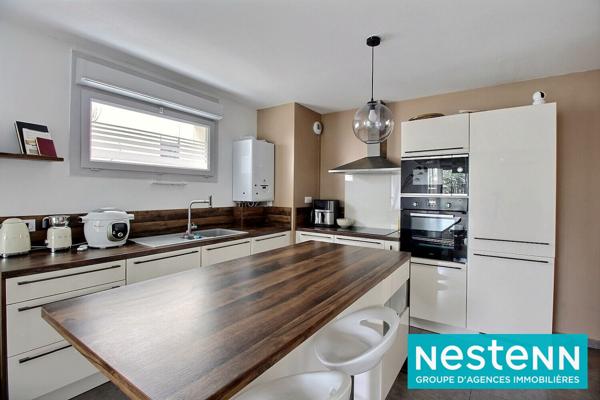 Appartement T4 lumineux 77 m² avec balcon plein sud, résidence récente, cave et parking - Meyzieu