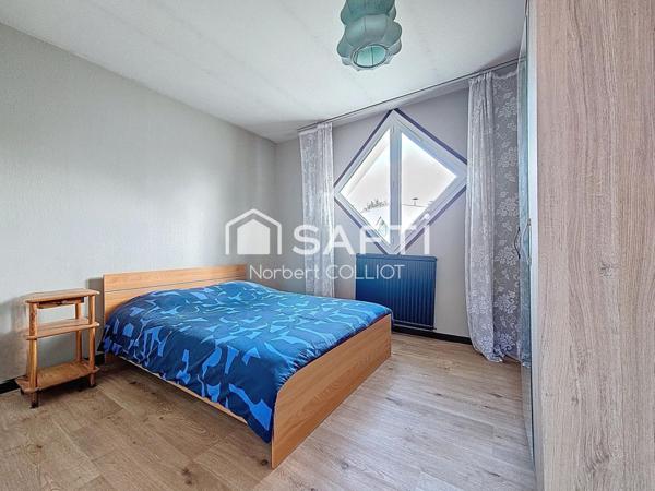 Maison 3 chambres dans une résidence familiale