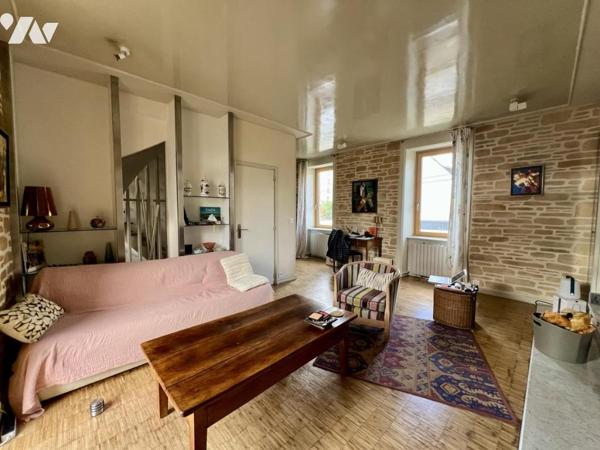MERVILLE - Beaux volumes pour cette maison avec jardin et garage