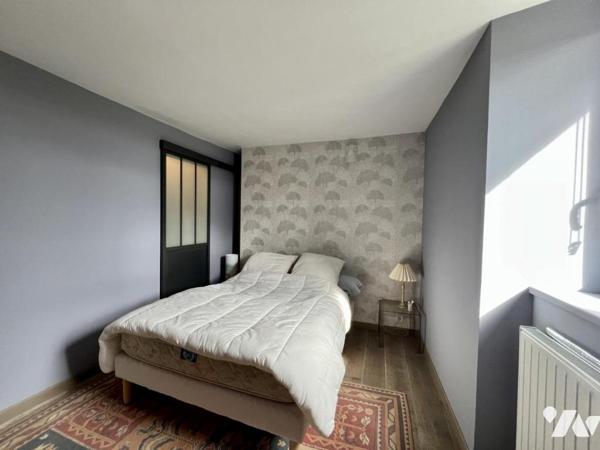 MERVILLE - Beaux volumes pour cette maison avec jardin et garage