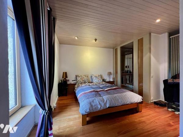 MERVILLE - Beaux volumes pour cette maison avec jardin et garage