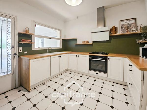 Maison 200m² au coeur de Castelculier avec terrasse couverte, 4 chambres, garage