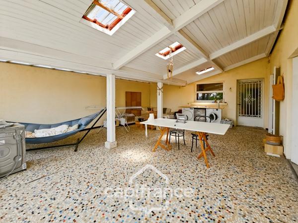 Maison 200m² au coeur de Castelculier avec terrasse couverte, 4 chambres, garage