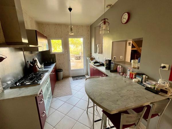 Maison familiale avec garage, terrain et dépendance