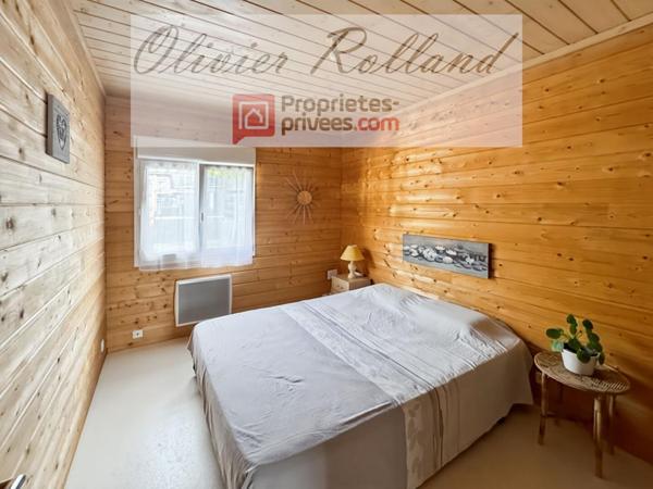 Chalet d'exception en bois massif (DPE B) - Plain-pied 135 m², 4 chambres, véranda & annexes sur 1 318 m² de terrain