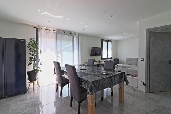 Maison de ville 135 m² environ, 4 chambres, garage, caves et jardin