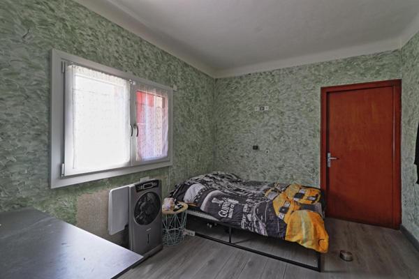 Maison de ville 135 m² environ, 4 chambres, garage, caves et jardin