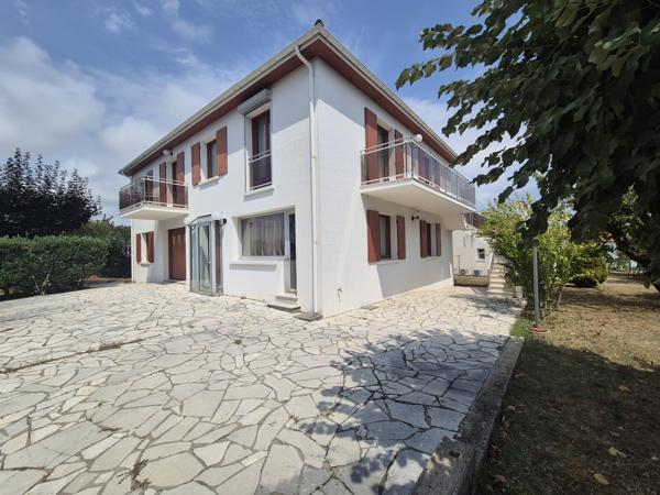 Maison 7 pièce(s) 4 chambre(s) 190 m²