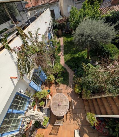 Charmante maison de ville avec jardin et toit terrasse