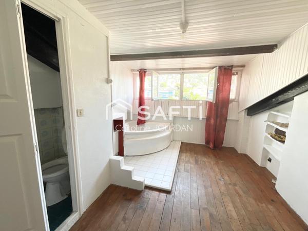 Studio mansardé 44m2 habitable - boulevard Stalingrad - calme, lumière et vue dégagée