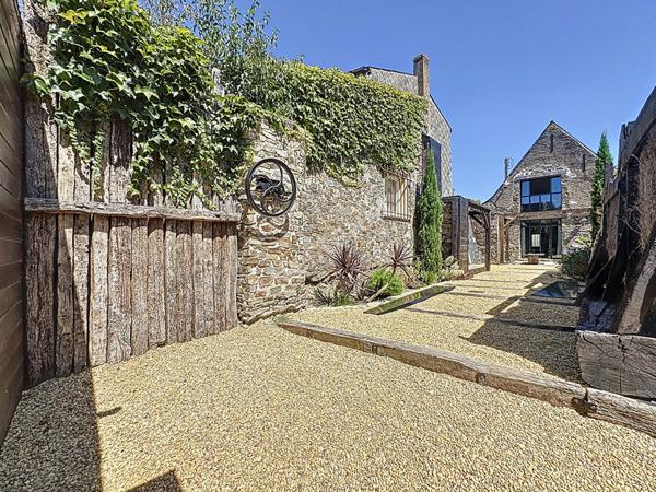 Maison en pierre rénovée à vendre à Saint-Géréon - Charme et confort, 4 chambres, à deux pas de la gare !