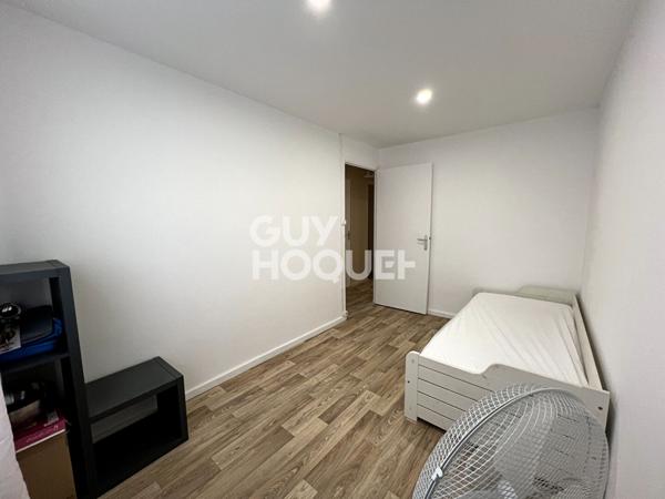 A LOUER au centre de Lyon 8 ème, un T4 avec balcon et parking