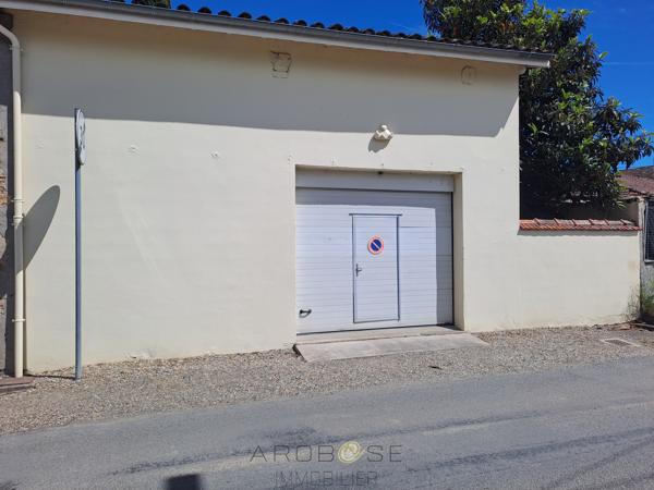Maison de village 8 pièces, à pied des commerces, avec véranda, jardinet et grand garage