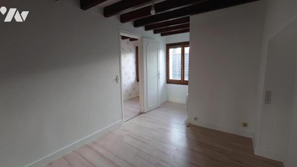 MAISON DE VILLAGE AVEC JARDIN ET GARAGE