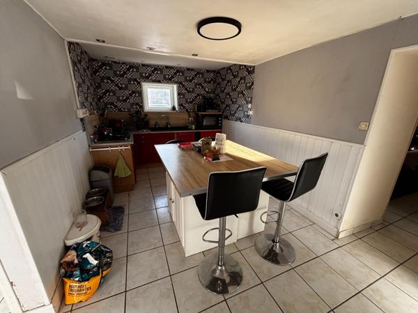 Maison avec une dépendance et jardin constructible