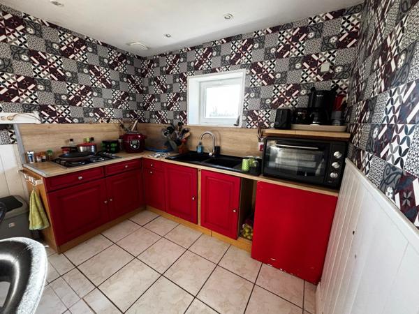 Maison avec une dépendance et jardin constructible