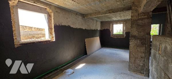 Appartement en surface brute en souplexe.