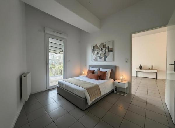 Appartement RDC + Terrasses + Jardin + Parking