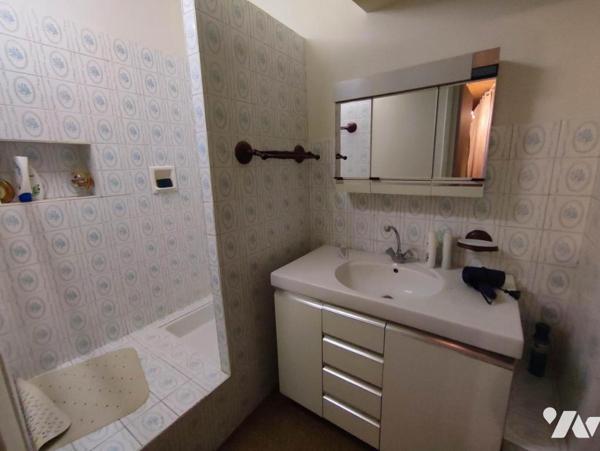 Appartement de 270 m² habitable + cave + garage