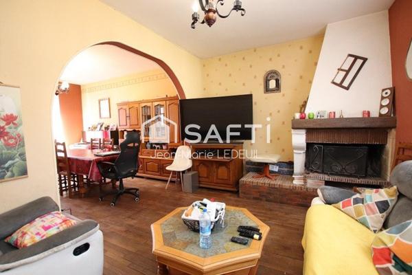 Maison 4 chambres, garage, dépendance et jardin.