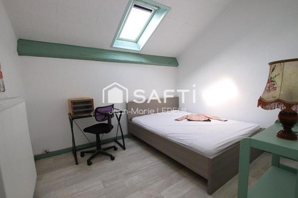 Maison 4 chambres, garage, dépendance et jardin.