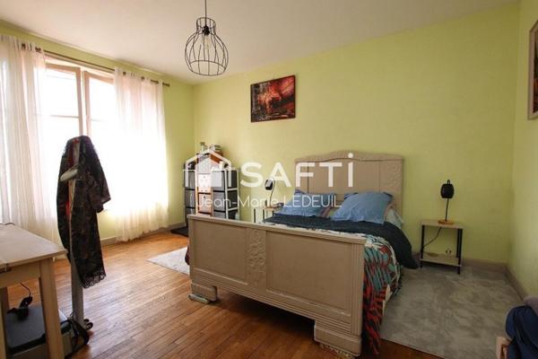 Maison 4 chambres, garage, dépendance et jardin.