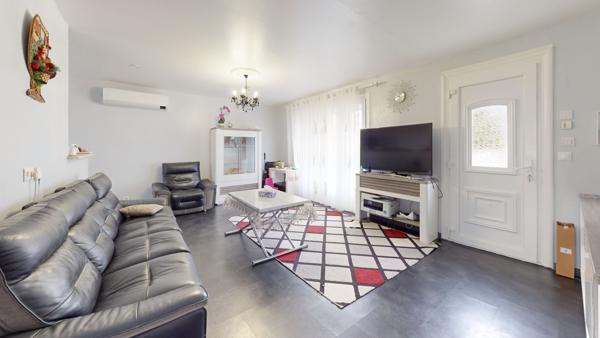 Maison familiale avec sous-sol aménagé et jardin