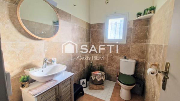 Maison plain-pied  Fonctionnelle et lumineuse dans un environnement calme