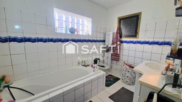 Maison plain-pied  Fonctionnelle et lumineuse dans un environnement calme