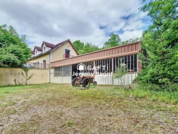 Ensemble immobilier sur plus de 2,7 hectares de nature préservée