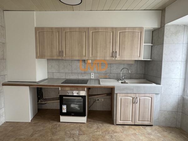 Immeuble de rapport rénové - 3 appartements et un local commercial