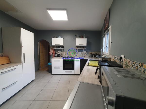 VENTE : Maison de village avec garage et jardin