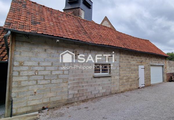 Ancien corps de ferme, jardin, garage et 4 chambres
