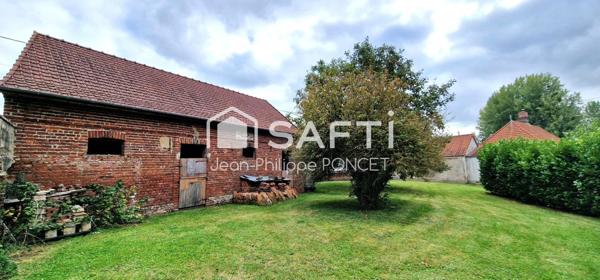 Ancien corps de ferme, jardin, garage et 4 chambres