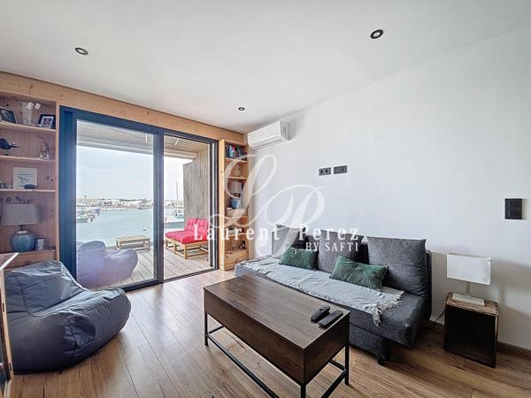 Duplex coup de cœur face au port avec vue imprenable et prestations haut de gamme