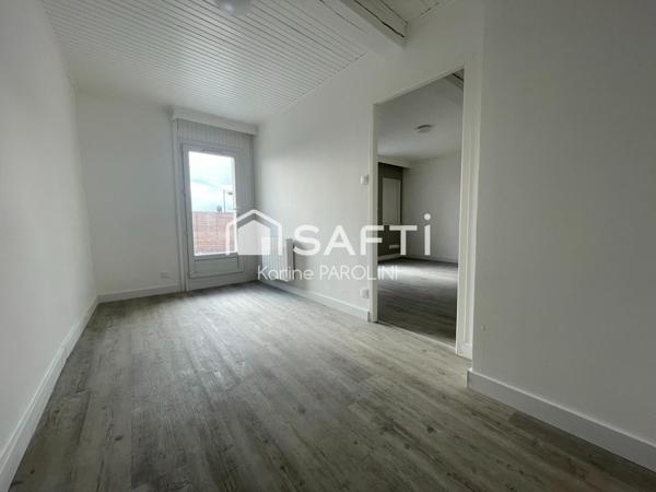 Duplex rénové avec terrasse au cœur de la ville