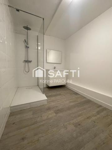 Duplex rénové avec terrasse au cœur de la ville