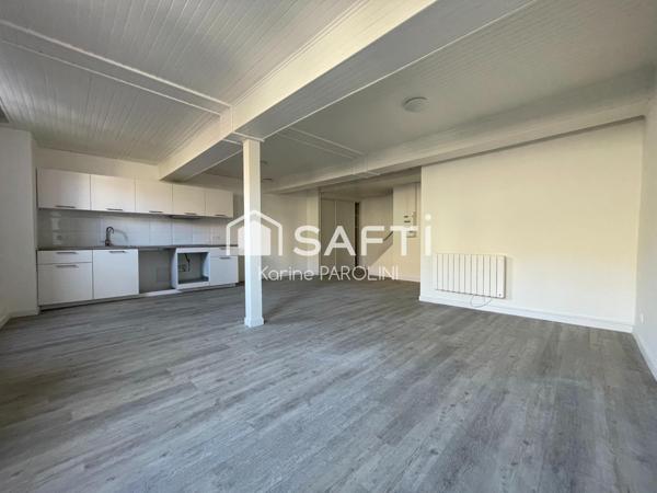 Duplex rénové avec terrasse au cœur de la ville