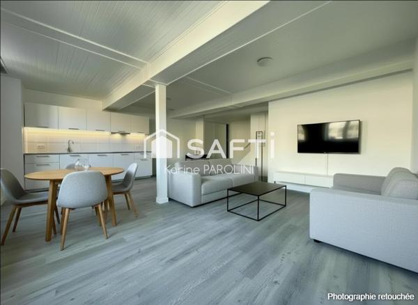 Duplex rénové avec terrasse au cœur de la ville