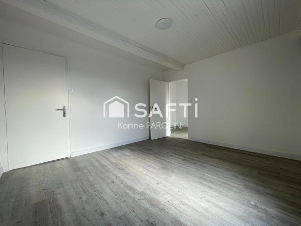 Duplex rénové avec terrasse au cœur de la ville