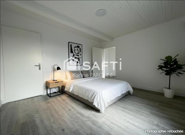 Duplex rénové avec terrasse au cœur de la ville