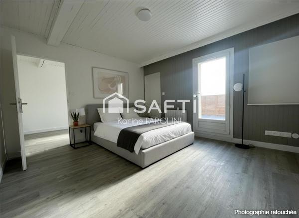 Duplex rénové avec terrasse au cœur de la ville