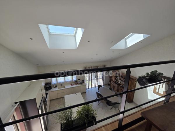 à vendre!! Maison d'architecte de plain pied 3 chambres avec sous-sol semi enterré