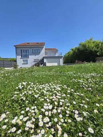 à vendre!! Maison d'architecte de plain pied 3 chambres avec sous-sol semi enterré